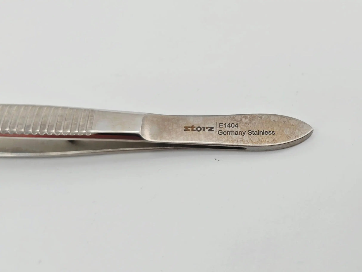 Storz E1404 Straight Heavy Serrated Dressing Forceps Ophthalmology 4" Primis Medical