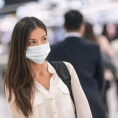 Young woman wearing a facemask